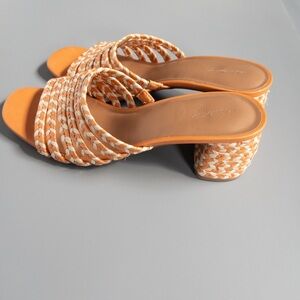 Orange braided sandal for vacation or the island
